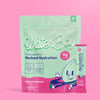 Pack of Waterboy hydration supplements with a sachet against a pink background.